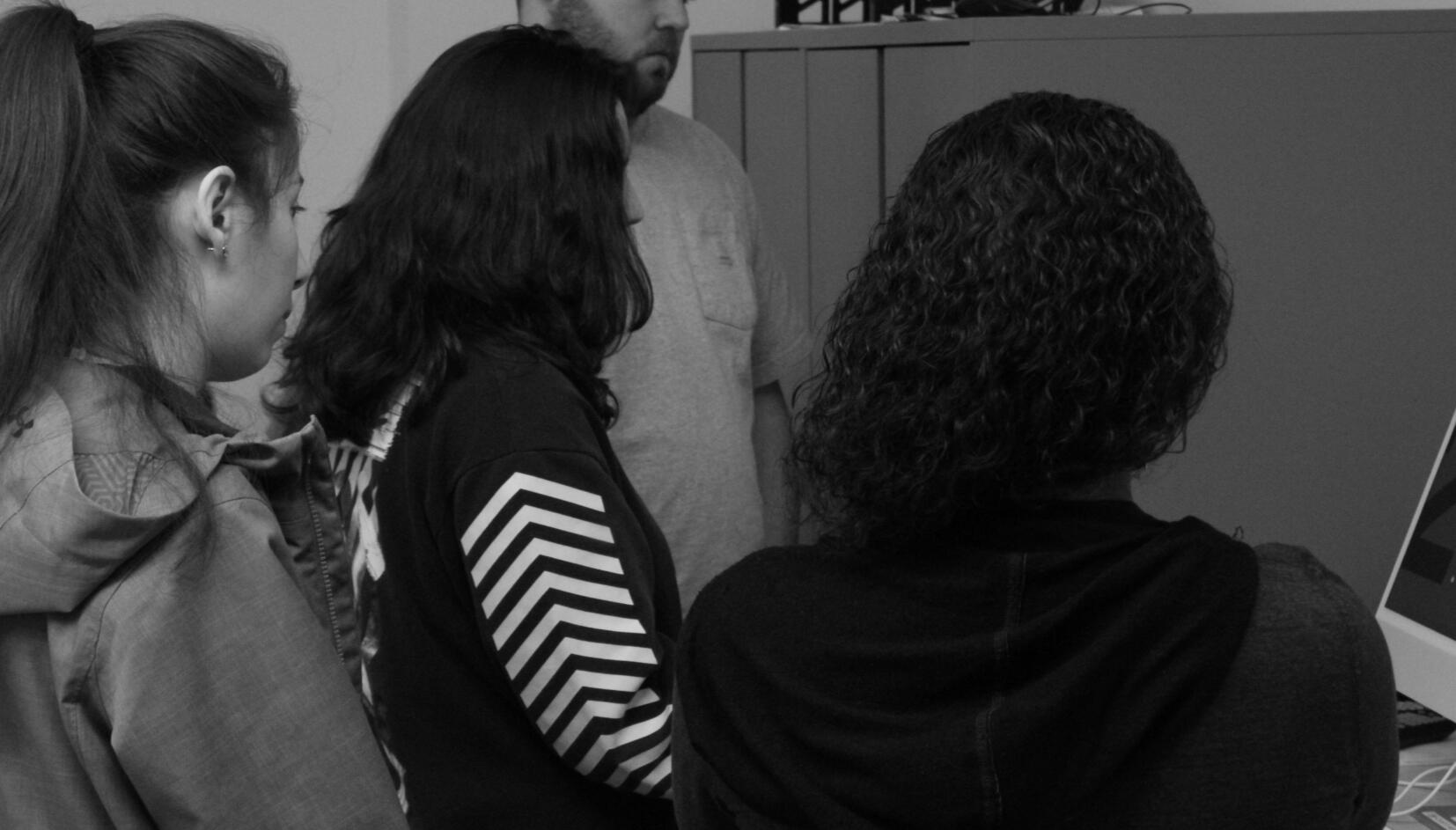 An example of us {my team and I} coming together and presenting our work to our client.